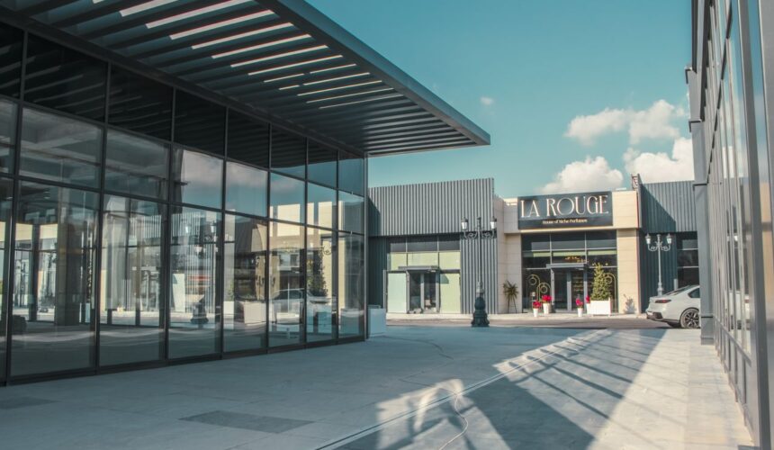 shopping arcade featuring modern architecture and glass facades