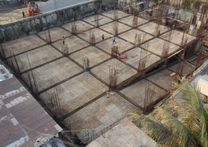 closw onstruction workers at a large building site