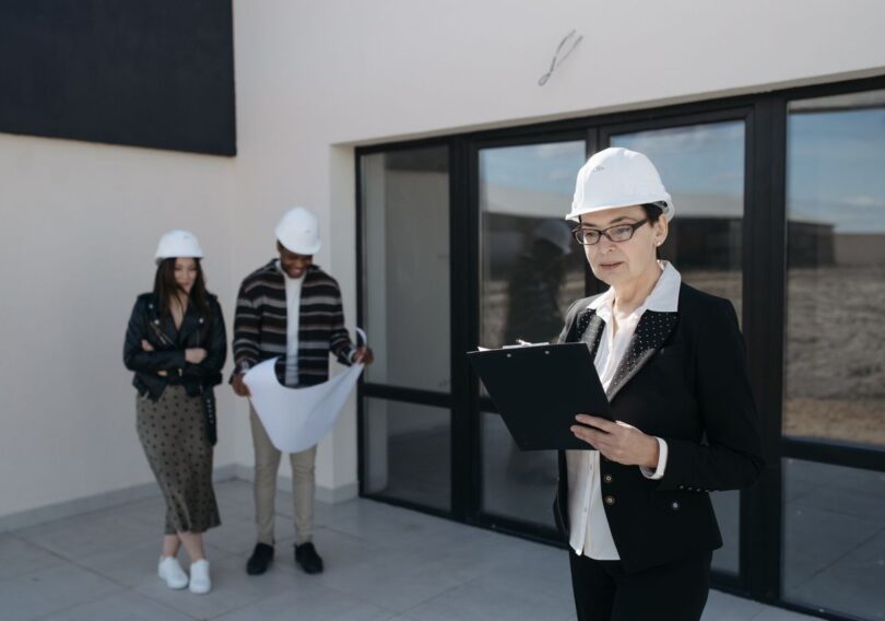 CLOSW Construction project manager reviewing plans with client