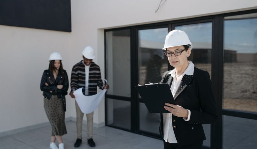 CLOSW Construction project manager reviewing plans with client