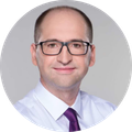 Portrait of man in glasses in tie and shirt